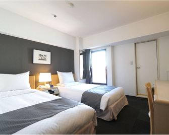 Hotel The Centre Utsunomiya - Ucunomija - Ložnice