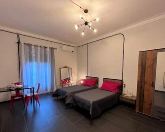 Minardi Apartments - Vercelli - Camera da letto