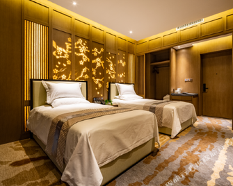 Yeohwa Oriental Hotel (Harbin Haxi Wanda Plaza) - Harbin - Yatak Odası