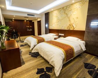 Heng Feng Hotel - Tangshan - Camera da letto