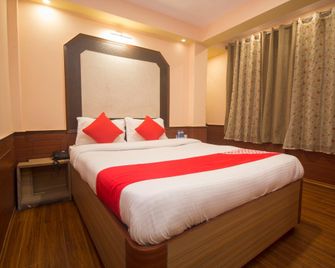 OYO New Amber Hotel - Darjiling - Schlafzimmer
