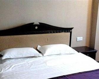 Golden Dragon Hotel Langzhong - Bazhong - Bedroom