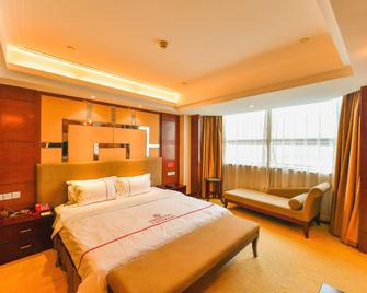 Jianghan Pearl International Hotel - Jingmen - Slaapkamer