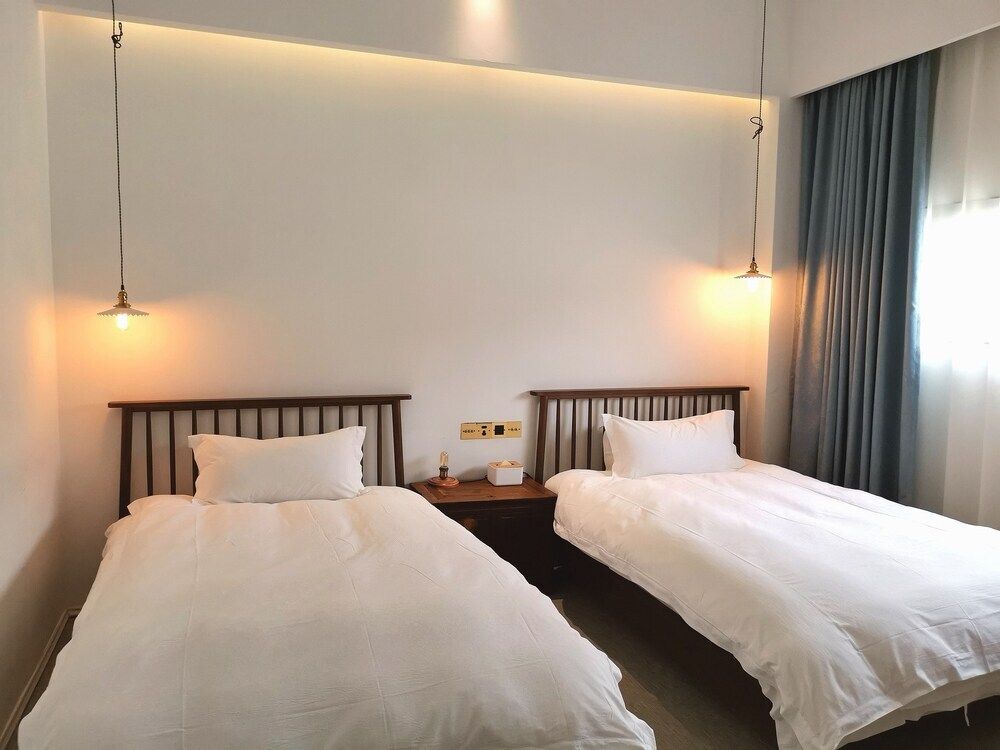 Suzhou Unique Space Design Art Hotel - סוג'ואו - חדר שינה