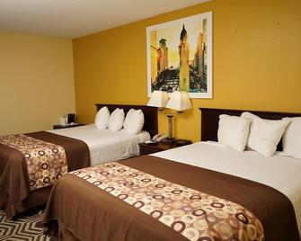 Days Inn & Suites by Wyndham Harvey / Chicago Southland - Harvey - Bedroom