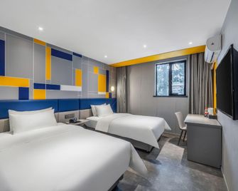 7 Days Inn - צ'נגשה - חדר שינה