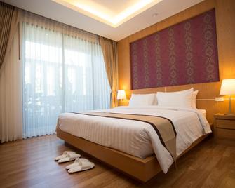 Baitong Hotel - Tachilek - Habitación