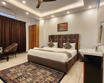 Azizia Inn - Srinagar - Slaapkamer