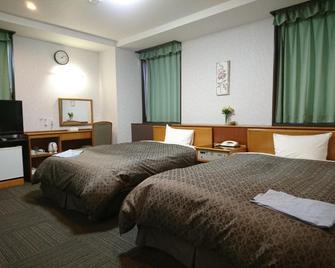 Terminal Hotel Matsuyama - Matsuyama - Phòng ngủ