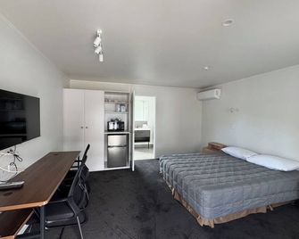 جروزفينور موتور إن - هاملتون - غرفة نوم