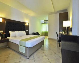 Hotel Icon Classic - Kottayam - Habitación