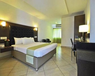 Hotel Icon Classic - Kottayam - Habitación