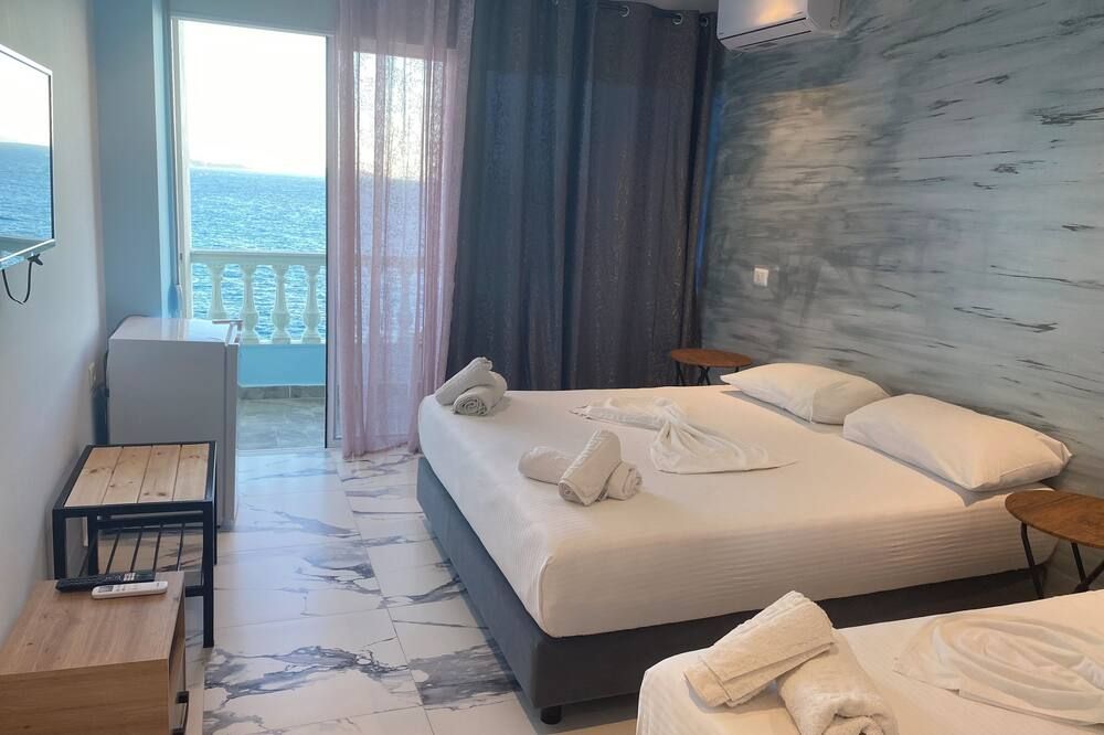 Kalemi's Beachside Hotel - סאראנדה - חדר שינה