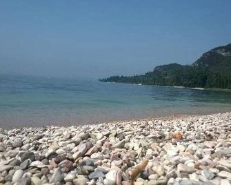 Comfortable apartment with garden in Garda - Garda - Strand