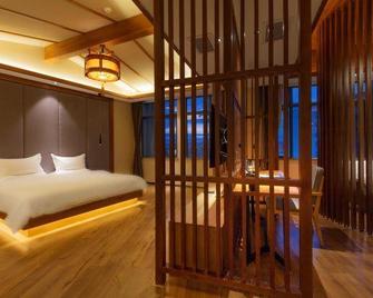 Lanmeishan Business Hotel (Pu'er Simao Airport) - Pu'er - Bedroom