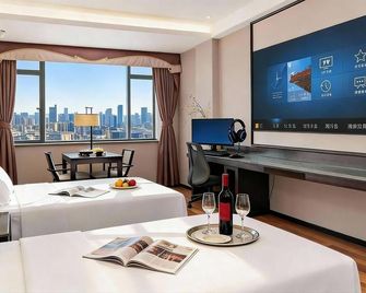 Crystal Pudi Hotel (Jingdezhen Taoyangli People's Square) - Jingdezhen - Habitación