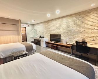 Da XI Lao Cheng Si Ji Xing Guan - Taoyuan City - Bedroom