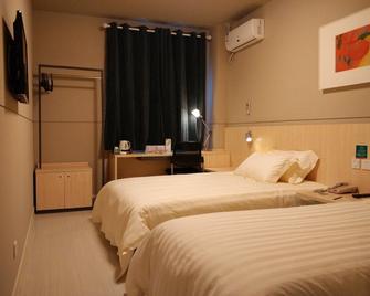 Jinjiang Inn Shenyang Xinggong North Street Metro - Шеньян - Спальня