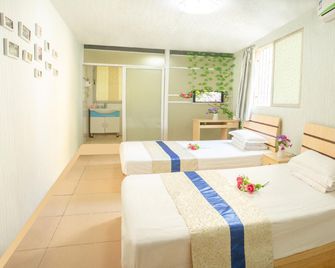 Xinyangguang Apartment - Ксіамен - Спальня