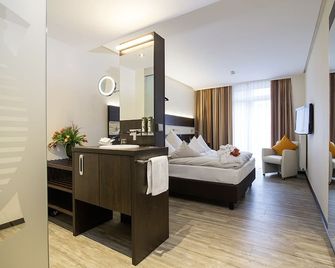 فندق كونكورد آم لاينشلوس - هانوفر - غرفة نوم