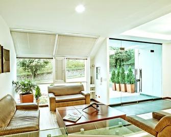 Habitat Suites Hotel - Pereira - Living room