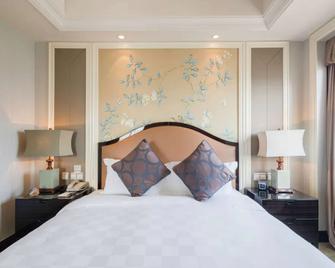 رمادا بلازا تيان لو - وهان - غرفة نوم