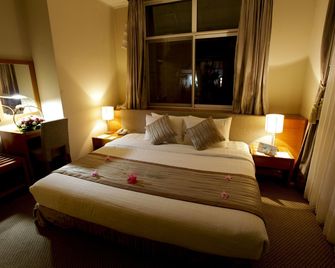 Muong Thanh Holiday Da Lat Hotel - דה לאט - חדר שינה