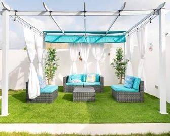 15 minutes from the punta cana airport,5.6 miles from coco bongo - Bavaro - Innenhof