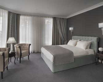 London Boutique Hotel - צ'יסינאו - חדר שינה