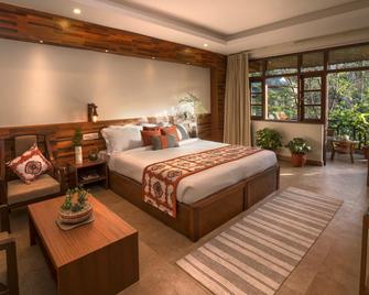 Blossoms Village Resort - דרמאסאלה - חדר שינה