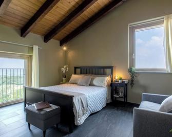döit - Turismo e Cultura - Coniolo - Schlafzimmer