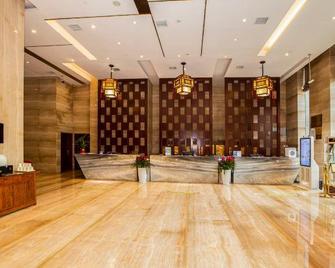 Loudi 418 Huatian Grand Hotel - Loudi - Front desk