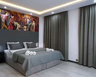 Hotel Varla - Koetaisi - Slaapkamer