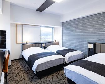 Apa Hotel & Resort Sapporo - Sapporo - Kamar Tidur