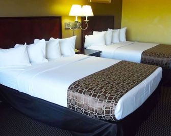 Ambassadors Inn & Suites - Virginia Beach - Kamar Tidur