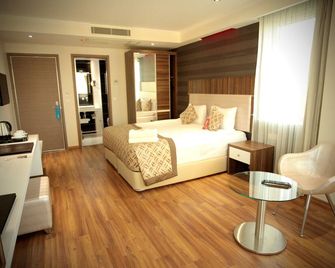 Edis Premier Hotel - Adana - Phòng ngủ