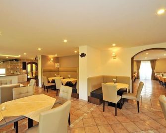 Dreibettzimmmer - Pension Piovesan - Latschach - Restaurant