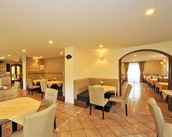 Dreibettzimmmer - Pension Piovesan - Latschach - Restaurant