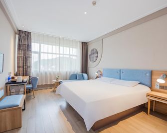 Home Inn Hangzhou Xiaoshan Tonghui Road Darunfa - האנגג'ואו - חדר שינה