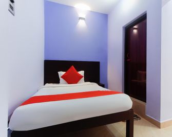 Hotel O Blue Falls Resort - Kuttālam (Tirunelveli) - Bedroom