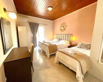 Oasis Beach Club - Kavos - Makuuhuone