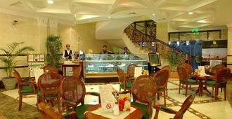 Al Madinah Harmony Hotel - Medine - Restoran
