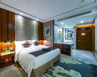 Palm Spring Hotel - Zhuhai - Bedroom