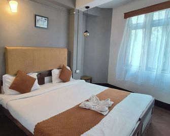 Hotel Sakura Darjeeling - Darjeeling - Phòng ngủ