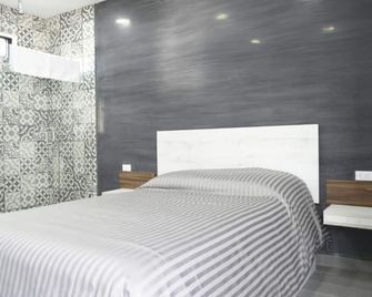 TJ Border Suites by Hosted by Me - טיחואנה - חדר שינה