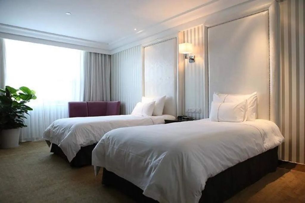Nanjing Grand Da Qiao Hotel - نانجينغ - غرفة نوم