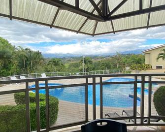 Relax in style\nUnwind in Beauty: Private home with Breathtaking Views in Grecia\n - Grecia - Piscina
