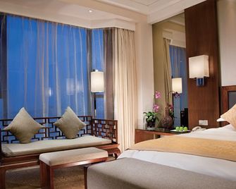 Yidu Jinling Grand Hotel Yancheng - Yancheng - Schlafzimmer