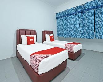 OYO 90544 M&h Hotel - Teluk Ramunia - Camera da letto