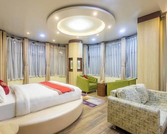 The Sr Hotel - Jogīkuti - Habitación